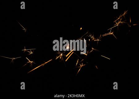 Best photo of real sparkler with sparks on black background for overlay blending mode Stock Photo