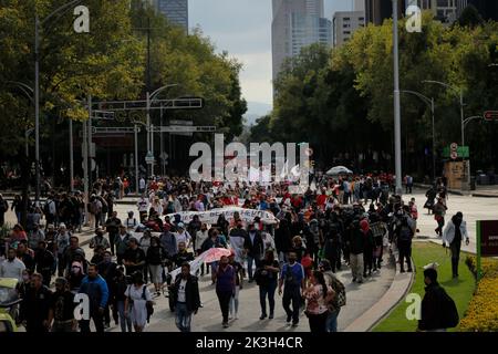 Mexico, Mexico. 26th Sep, 2022. Protesters march on the street during a demonstration to commemorate the 8th anniversary of the disappearance of the 43 Ayotzinapa students. On the night of September 26, 2014, 43 students from the Raœl Isidro Burgos Rural Normal School located in Iguala, Guerrero, were victims of forced disappearance by members of public security from the state of Guerrero and federal military security.The students had allegedly tried to hijack trucks to use for their protests. Credit: SOPA Images Limited/Alamy Live News Stock Photo