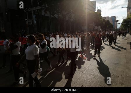 Mexico, Mexico. 26th Sep, 2022. Protesters march on the street during a demonstration to commemorate the 8th anniversary of the disappearance of the 43 Ayotzinapa students. On the night of September 26, 2014, 43 students from the Raœl Isidro Burgos Rural Normal School located in Iguala, Guerrero, were victims of forced disappearance by members of public security from the state of Guerrero and federal military security.The students had allegedly tried to hijack trucks to use for their protests. Credit: SOPA Images Limited/Alamy Live News Stock Photo