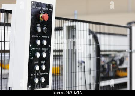 Remote operation panel of manufacturing equipment. Selective focus. Stock Photo