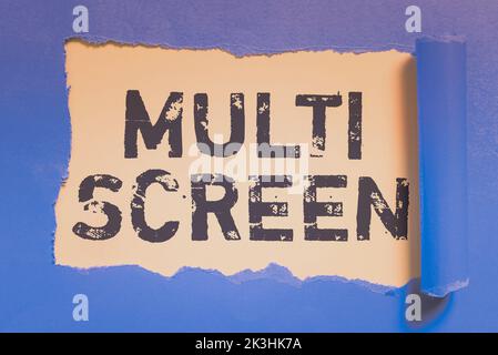 Hand writing sign Multi Screen. Word Written on Having or involving several screen especially in a cinema Stock Photo