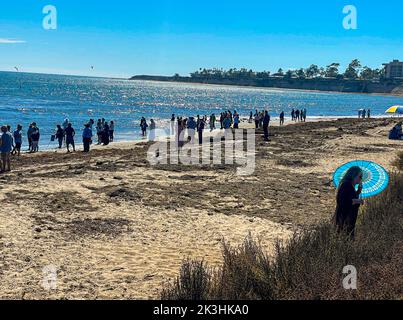 Goleta, CA, U.S.A. 26th Sep, 2022. Tashlich, which literally translates to 'casting off,'' is a ceremony performed on the afternoon of the first day of Rosh Hashanah. During this ceremony, Jews symbolically cast off the sins of the previous year by tossing pebbles or bread crumbs into flowing water. In Santa Barbara, September 26, 2022, hundreds of members representing every Jewish congregation in Santa Barbara (including seven rabbis) met at Goleta Beach, a long time tradition. to enact this ancient rite, eat honey-bread and apples, swim and schmooze with community members, many who h Stock Photo