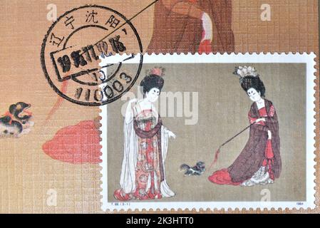 CHINA - CIRCA 1984:A stamp printed in China shows 1984 T89 Beauties Wearing Flowers Stamps Painting, circa 1984 Stock Photo