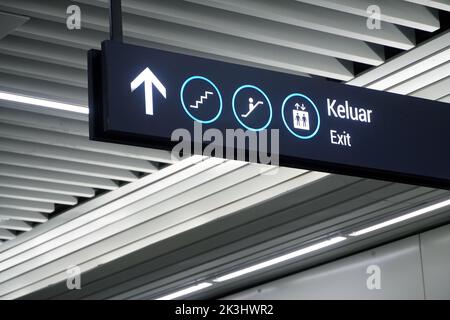 exit sign in MRT (Mass Train Trasport) Station in Jakarta, Indonesia. Sign location to Exit for passenger could use elevator, lift or stairs. Stock Photo