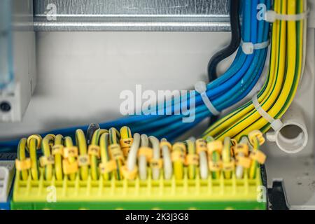 Close up circuit breakers and wire in control panel. Stock Photo