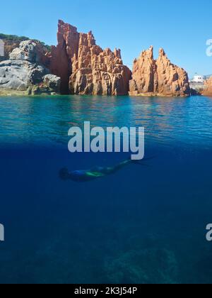 Snorkeling, Rocce Rosse, Arbatax, Tortolì, Provincia Ogliastra, Sardinia, Italy Stock Photo