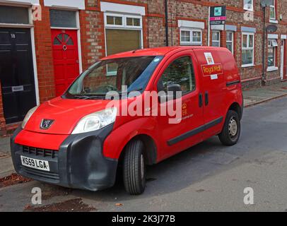 Red Royal Mail, post postal delivery van, in a Stockton Heath terraced street, South Warrington, Cheshire, England, UK, WA4 6NW Stock Photo