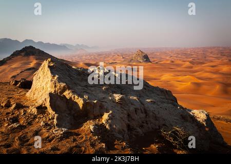 Maleha desert. Maleha is a big dunes in Sharjah, UAE. Fossil rock or pink rock is a hard rock structure right in between sand dunes, an natural wonder Stock Photo