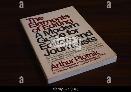 Side view of a pile of knowledgeable books Stock Photo