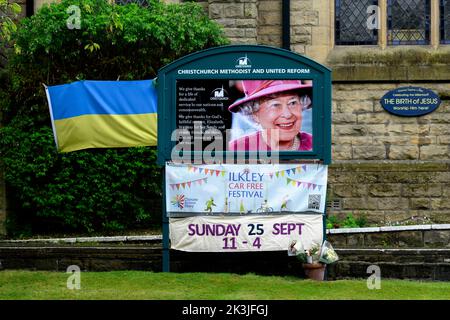 Queen's death (emotive poignant notice board colour photograph, remembering commemorating paying respects to Elizabeth 2) Ilkley Yorkshire England UK.