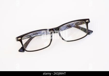 Close up of reading glasses on a white background. Stock Photo