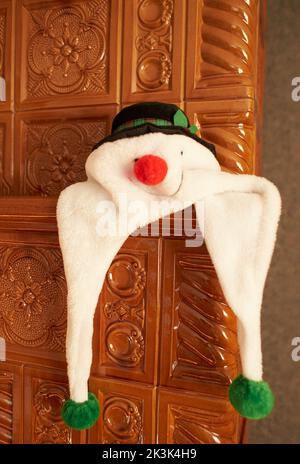 Close up of white Ceramic Santa, Chistmas candle and snowman. Stock Photo