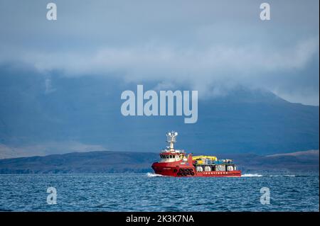 September 2022: Isle of Canna, Inner Hebrides, Scotland A small boat travelling between the Islands