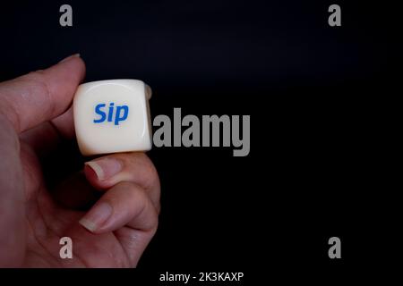 Drinking dice game isolated on black background Stock Photo