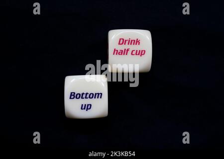 Drinking dice game isolated on black background Stock Photo