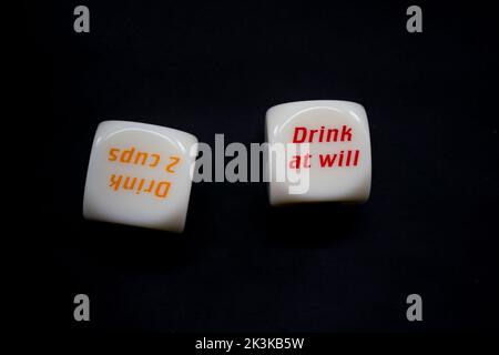 Drinking dice game isolated on black background Stock Photo