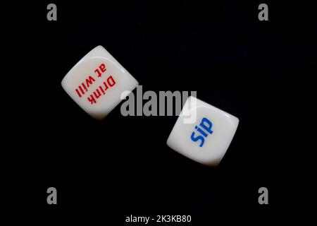 Drinking dice game isolated on black background Stock Photo