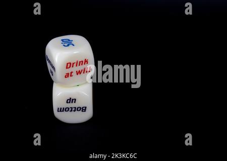 Drinking dice game isolated on black background Stock Photo