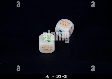 Drinking dice game isolated on black background Stock Photo