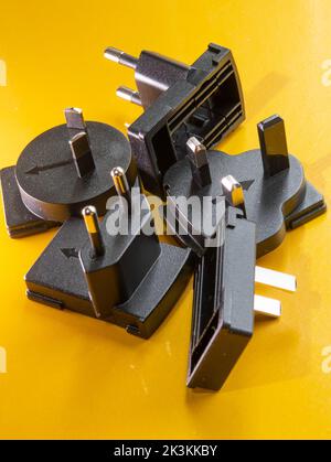 Still life of various worldwide electric plug adapters, 2022 Stock Photo