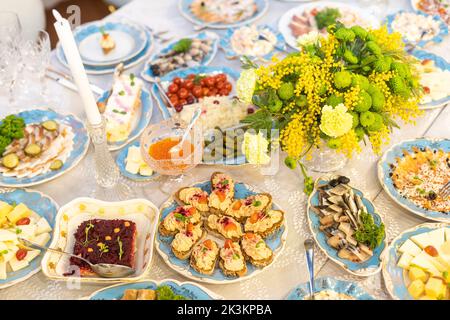 Served for a banquet table. Banquet table Images. Long dinner tables covered with white cloth Stock Photo