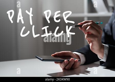 Hand writing sign Pay Per Click. Word Written on Internet Advertising Model Search Engine marketing Strategy Stock Photo