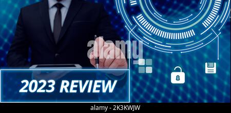 Conceptual caption 2023 Review. Business concept seeing important events or actions that made previous year Stock Photo