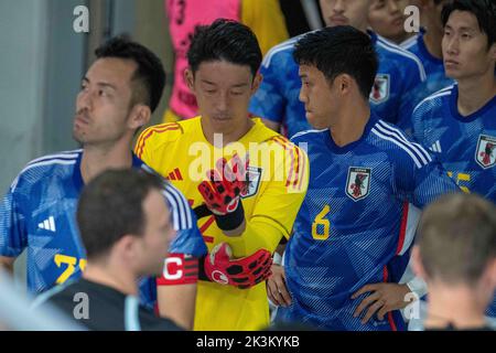 Dusseldorf, North Rhine Westphalia, Germany. 23rd Sep, 2022. Japan starting goalkeeper SHUICHI GONDA (12, second from left) adjusts his sleeve before going onto the pitch for the 2022 Kirin Challenge Cup against the US in the Merkur Spiel Arena in Duuseldorf, Germany. (Credit Image: © Kai Dambach/ZUMA Press Wire) Stock Photo