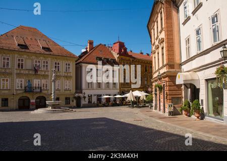 Ljubljana, Slovenia - Sept 4 2022. The picturesque Gornji Trg street in the upper old town of Ljubljana. Herkulov Vodnjak, or Hercules Fountain centre