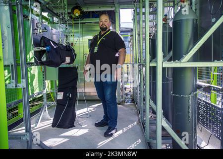Engineer at Skydiamond inspecting sky mining facility transforming carbon into diamonds in Stroud, Gloucestershire, United Kingdom. Stock Photo