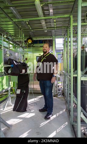 Engineer at Skydiamond inspecting sky mining facility transforming carbon into diamonds in Stroud, Gloucestershire, United Kingdom. Stock Photo