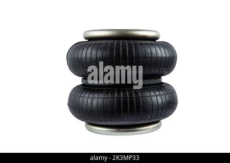 Rubber air cylinder close up on white background, truck pneumatic suspension spare parts, repair. Suspension springs. Stock Photo