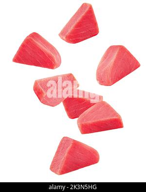 Falling raw tuna steak, fish isolated on white background, clipping path, full depth of field Stock Photo