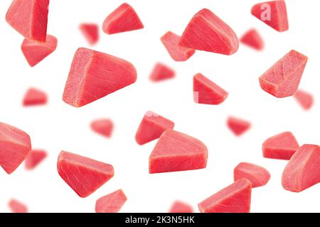 Falling raw tuna steak, fish isolated on white background, selective focus Stock Photo