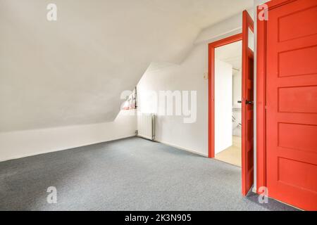 Interior of empty white room without windows with curtains and greyish floor Stock Photo