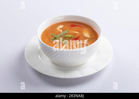 Bangladeshi style thai soup, chicken corn soup isolated on white background. Stock Photo