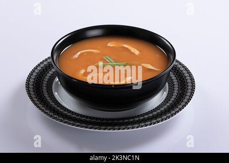 Bangladeshi style thai soup, chicken corn soup isolated on white background. Stock Photo