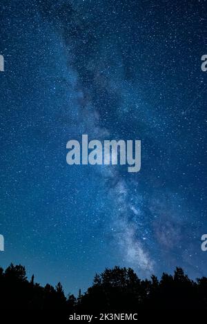 A vertical view of the Milky Way from the Adirondack Mountains, NY on a clear autumn night Stock Photo