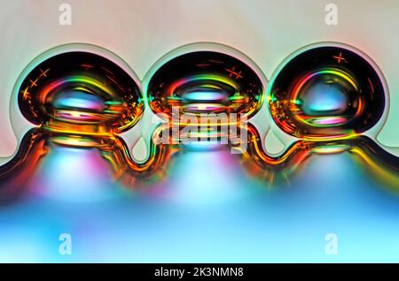 Air bubbles in vitamin C, light micrograph Stock Photo
