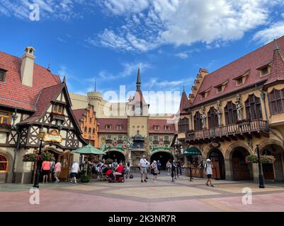 Bay lake, FL USA - September 15, 2022: Roadside view of tourists walking down the Germany Pavilion at the Epcot theme park Stock Photo