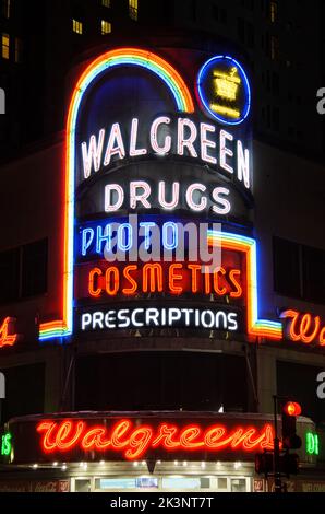 Neon sign outside store fronts in the Bourbon Street area of New Orleans, Louisiana, USA Stock Photo