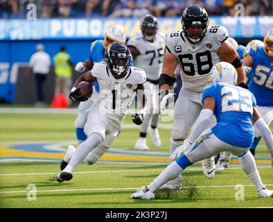 September 25, 2022 Jacksonville Jaguars running back Travis Etienne Jr. (1) carries the ball during the NFL football game between the Los Angeles Chargers and the Jacksonville Jaguars at SoFi Stadium in Inglewood, California. Mandatory Photo Credit : Charles Baus/CSM Stock Photo