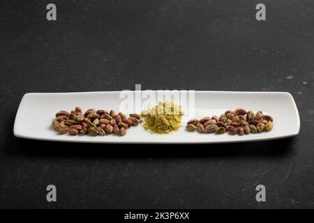 Nuts mix in a white plate Stock Photo