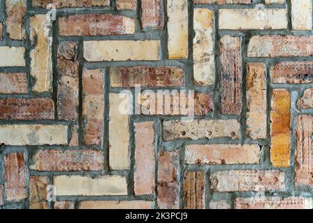 Brick wall background. Old vintage colored rustic brickwork backdrop for decorative home design. High quality photo Stock Photo