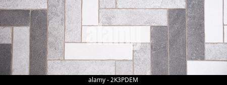 Seamless black white and grey mosaic marble floor tile texture in geometric shape pattern Stock Photo