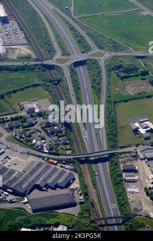 Aerial View of A5 Road and former ALPOCO Aluminium Smelting plant. Holyhead, Anglesey, North Wales, Stock Photo