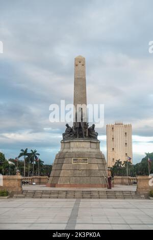 Manila, Philippines - People enjoying a sunny day at Rizal Park Stock Photo