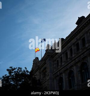 The Spanish and European flags flying on a building in the center of Madrid, Spain Stock Photo