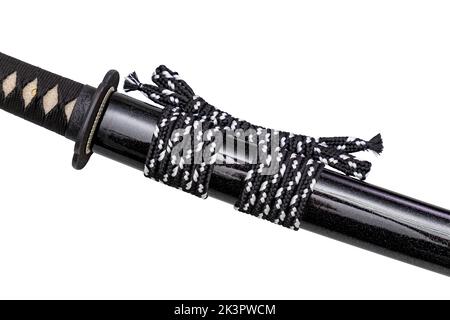 Close up shot of Sageo - Thick black-white silk rope for tying the scabbard of Japanese swords. It was a rope for the samurai to tie at the waist. iso Stock Photo