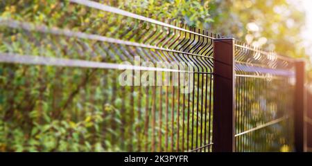 welded metal wire mesh panel fence. banner with copy space Stock Photo